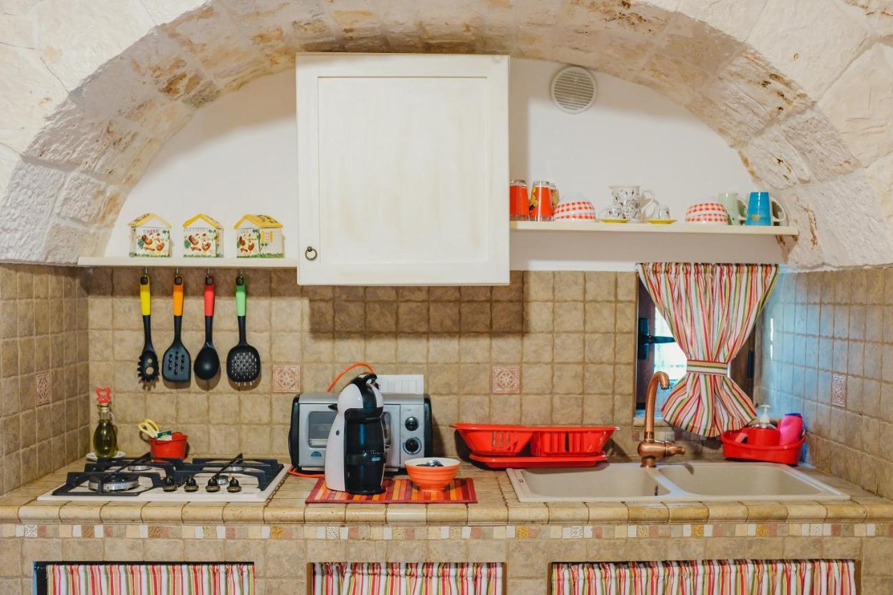 Trulli Borgo Lamie Villa โลโกโรตอนโด ภายนอก รูปภาพ